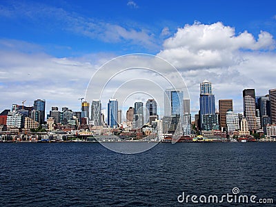 Waterfront Park with Ferris Wheel, Pier 56, and cityscape Editorial Stock Photo