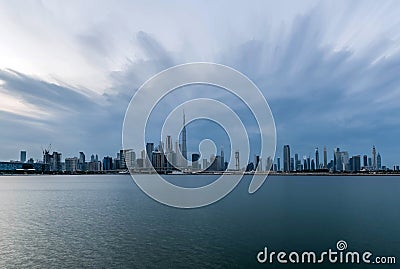 Waterfront view of Burj Khalifa, World Tallest Tower under Cloudy Sky. A view from Sheikh Stock Photo