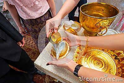 Watering The Conch Thai Traditional Wedding Ceremony Asian Culture for Artwork Design Stock Photo
