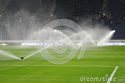 watering field at halftime of match photo was taken during the between fc dnipro dnipropetrovsk city and fc olimpik donetsk city Editorial Stock Photo