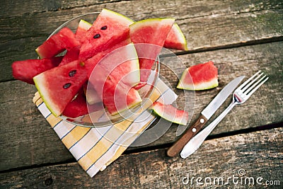 Watermelon cuts in bowl with cutlery Stock Photo