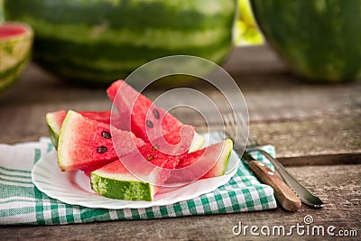 Watermelon cuts and plate with cutlery Stock Photo