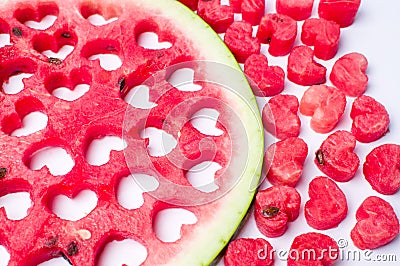 Watermelon fruit with heart shaped cut outs Stock Photo