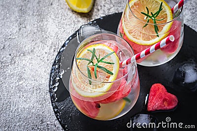 Watermelon lemon cocktail with pieces of watermelon in shape of heart. Valentine`s Day Concept Stock Photo