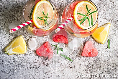 Watermelon lemon lemonade with pieces of watermelon in shape of heart. Refreshing summer drink concept Stock Photo