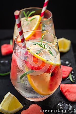 Watermelon lemon rosemary lemonade with pieces of watermelon in shape of heart Stock Photo