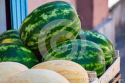 Watermelon with melon on a street market Stock Photo