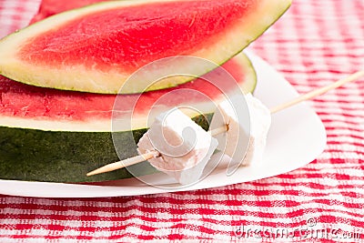 Watermelon slices & White cheese on plate Stock Photo