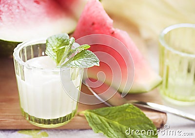 Watermelons and yogurt, shallow DOF Stock Photo