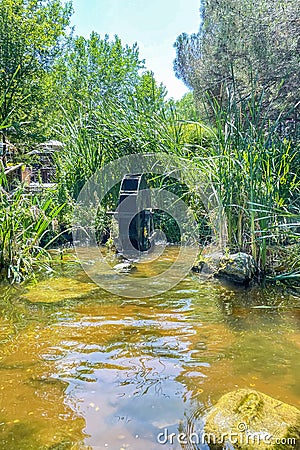 Watermills.Constantly Turning Wheels of Energy and Cultural Heritage from History to the Present Stock Photo