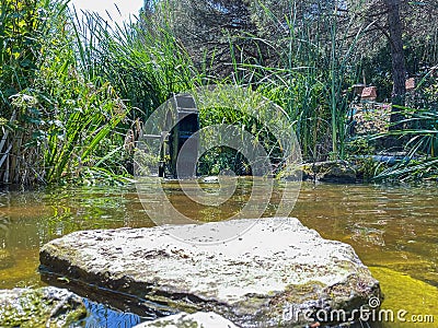 Watermills.Constantly Turning Wheels of Energy and Cultural Heritage from History to the Present Stock Photo