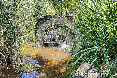 Watermills.Constantly Turning Wheels of Energy and Cultural Heritage from History to the Present Stock Photo