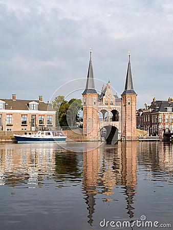 Waterpoort, water gate, and Kolk canal in city of Snits, Sneek in Friesland, Netherlands Stock Photo