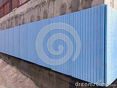 Waterproofing and thermal insulation of concrete building walls Stock Photo