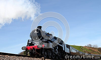 Waterside Park, Torbay, South Devon, England: The steam train, Braveheart, heads for Kingswear Stock Photo
