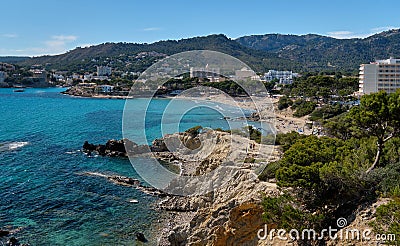 Waterside view turquoise sea rocky coastline of Paguera beach, Palma de Mallorca, Spain Stock Photo