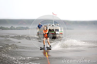 Waterskiing girl Stock Photo