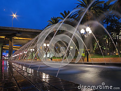 Waterspout fountain passage blur by night Editorial Stock Photo