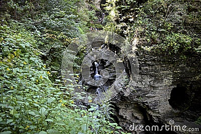 Trees and rivers find way in the rock formations at Watkins Glen, NY State Park Stock Photo