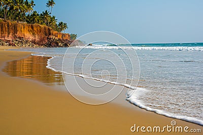 Wave is coming, close-up of the surf and sand Stock Photo