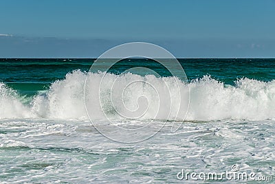 Wave crash and water splashes on a Black Sea beach Stock Photo