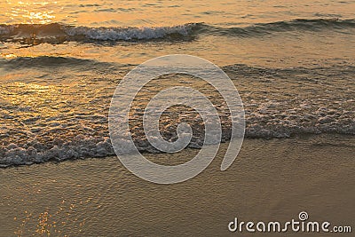 Wave crashing onto the beach. Sea surf. Nature. Stock Photo