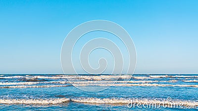 Wave crests in the blue sea Stock Photo