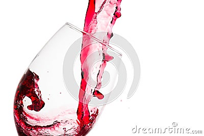 Wave formed on the pouring of red wine on a tasting glass Stock Photo