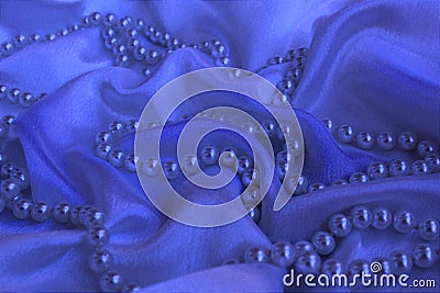 Wave satin fabric with necklace Stock Photo
