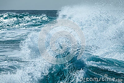 Wave strike against shallow water and creates beautiful art. Stock Photo