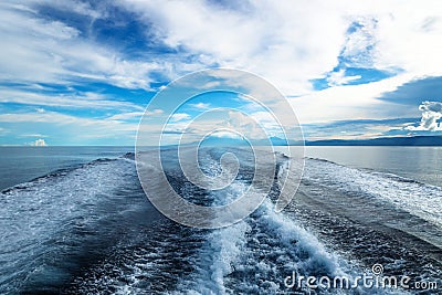 Wave trail from the boat in the ocean with Negros in the back, Philippines Stock Photo