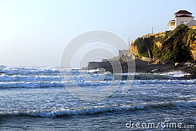 Waves of Atlantic Ocean on Praia das Macas (Apple Beach) Stock Photo