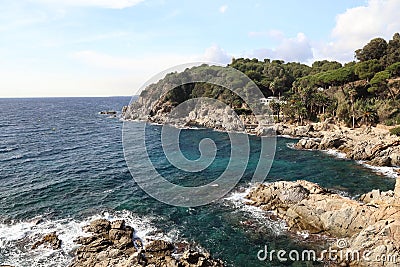 Waves beat on the rocky shore, Mediterranean Sea, Seaside villas Stock Photo