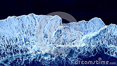 Waves on black sand. Stock Photo