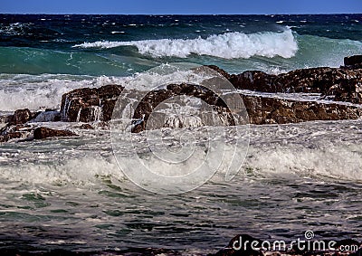 Waves breaking at rocks of the Indian Ocean at the Wild Coast of Stock Photo