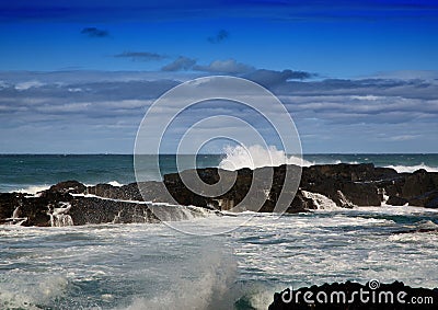 Waves breaking at rocks of the Indian Ocean at the Wild Coast of Stock Photo