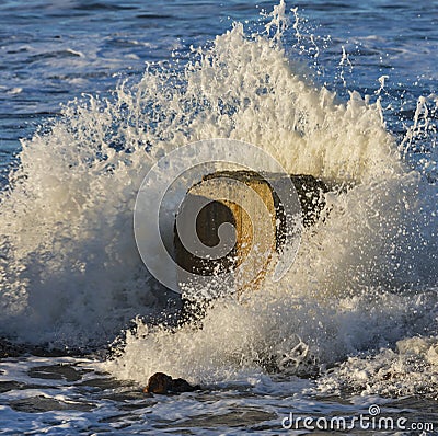 Waves crashing at Lossiemouth. Stock Photo