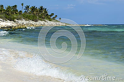 Waves crashing on shoreline of cozumel Stock Photo