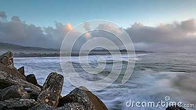 Waves hitting the scenic coast along Greymouth in New Zealand Stock Photo