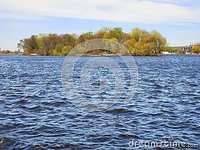 Waves on lake in fine spring weather Stock Photo