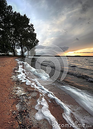 Waves of the lake at sunset2 Stock Photo