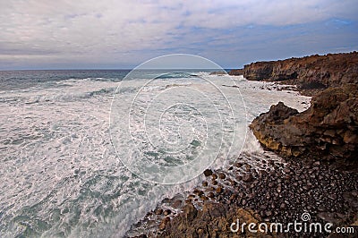 Waves on Lanzarote's volcanic coast Stock Photo