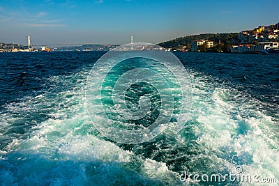 Waves made by ship engine on Bosphorus strait Editorial Stock Photo