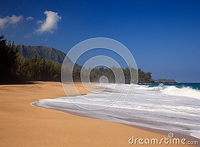 Waves over beach on Lumahai Stock Photo