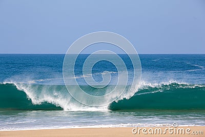 Waves over beach on Lumahai Stock Photo