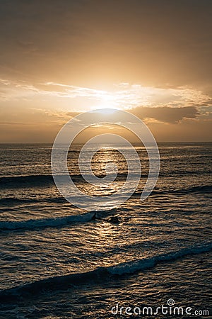 Waves in the Pacific Ocean at sunset, at Pearl Street Beach in Laguna Beach, Orange County, California Stock Photo