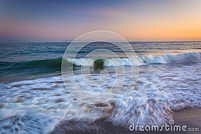 Waves in the Pacific Ocean at sunset, in Santa Barbara, Californ Stock Photo