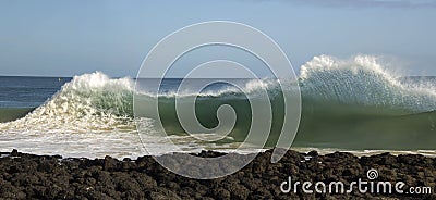 Waves pounding on basalt rocks at Ocean Beach Bunbury Western Australia Stock Photo