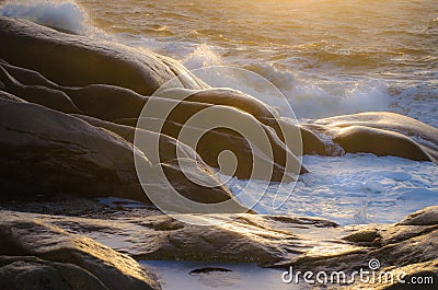 Waves on rocks Stock Photo