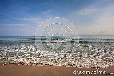 Waves on a Sandy Caribbean Beach Stock Photo